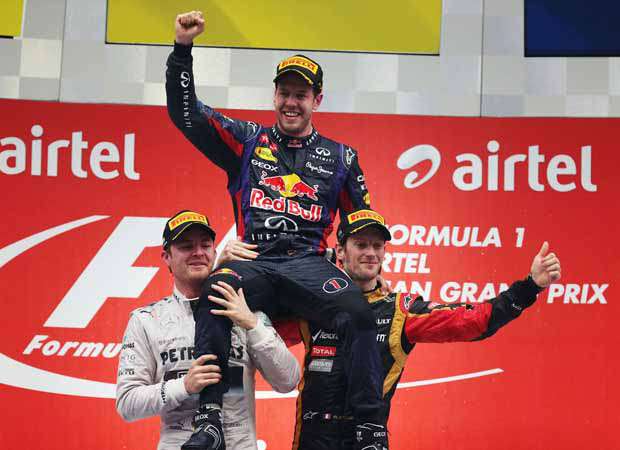 Vettel flanqueado por Rosberg y Grosjean