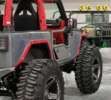 Jeep y Hummer con la mano de Dalto