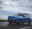 2026 Jeep® Cherokee driving next to body of water