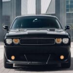 Muscle car extremo con motor V8 6.2 L sobrealimentado de 808 hp (hasta 840 hp con Demon Crate). Récord en el cuarto de milla: 9,65 s a 140 mph.