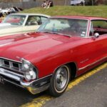 El Grand Prix precedió al icónico GTO en dos años, consolidando el concepto de personal luxury car con motores V8 potentes. Aunque no estaba pensado como un muscle car puro, modelos como el 421 Super Duty de 1962 muestran su legado en la historia automovilística americana.