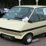 Originalmente llamado “Townscar”, este proyecto era una reinterpretación moderna del Mini original. Su diseño monovolumen compacto, con claras influencias en cuña, era sorprendentemente avanzado.

British Leyland compró los derechos y lo rebautizó como Minissima, presentándolo en el Salón de Londres de 1973. Aunque nunca llegó a producción masiva, el concepto sobrevivió en pequeñas series como el Elswick Envoy.