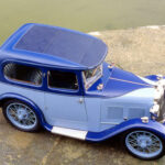 El Austin Seven Swallow, presentado en 1927, fue uno de los primeros compactos en ofrecer un nivel de acabado superior al modelo del que derivaba. Conservaba los bajos costes de utilización del Austin Seven, pero añadía una carrocería más elegante y un habitáculo mucho más cuidado. Su éxito fue tan importante que terminó dando origen a la marca Jaguar.